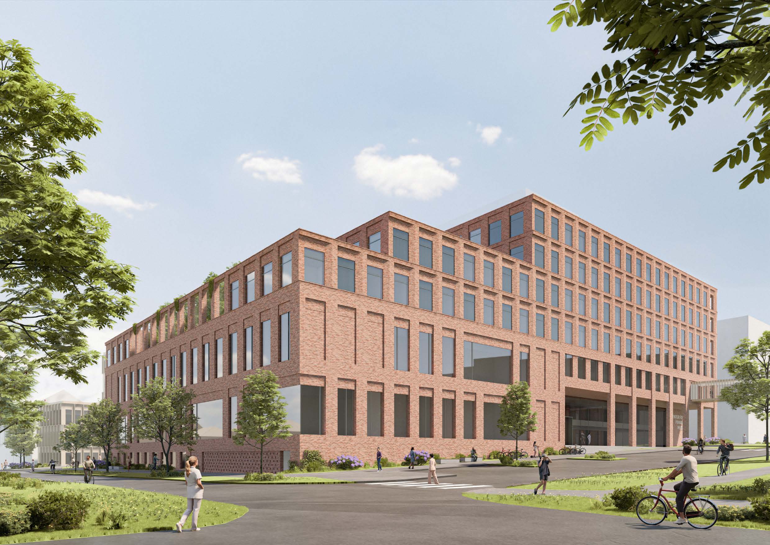 En stor murbygning med folk som gikk rundt