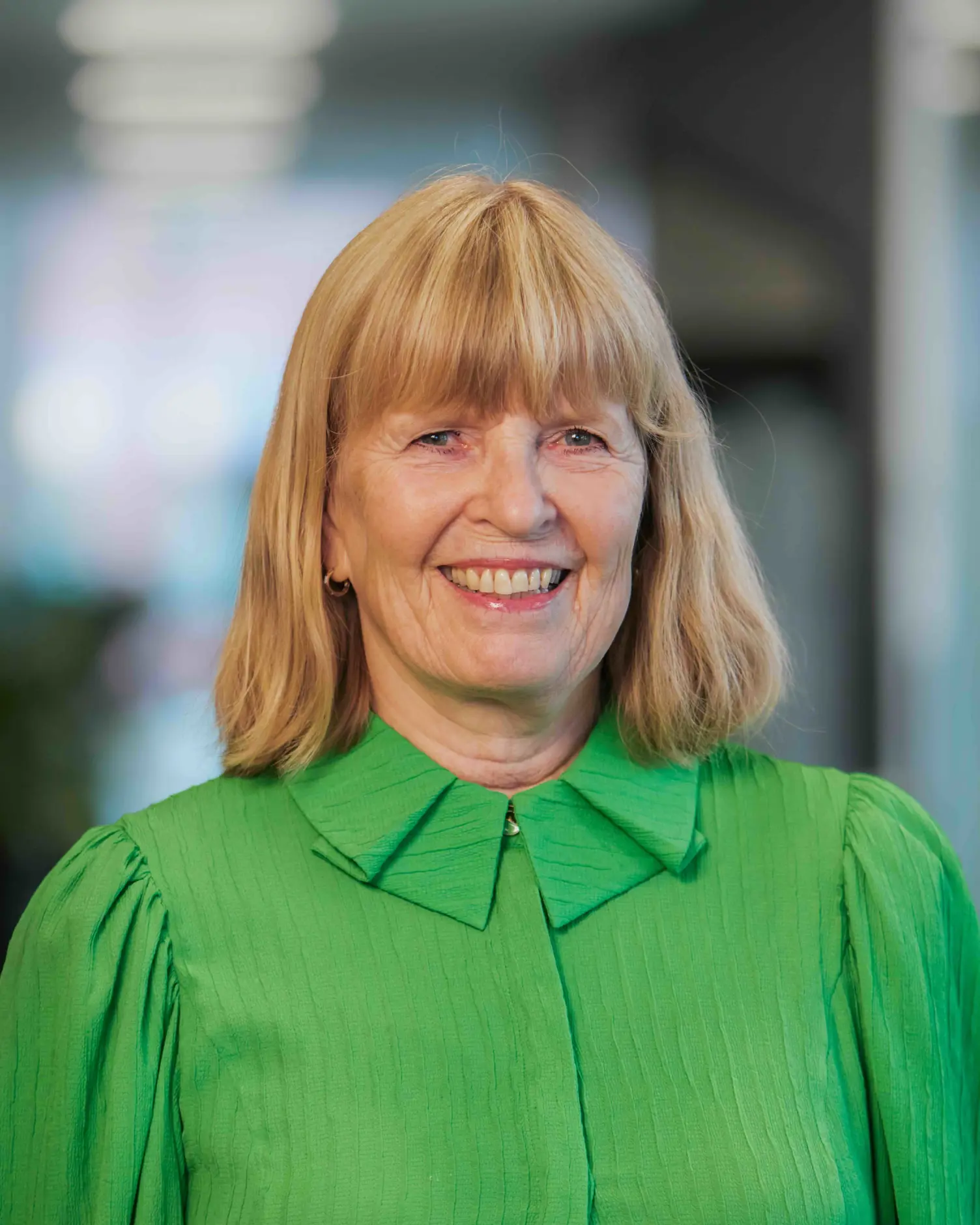 En person i grønn skjorte